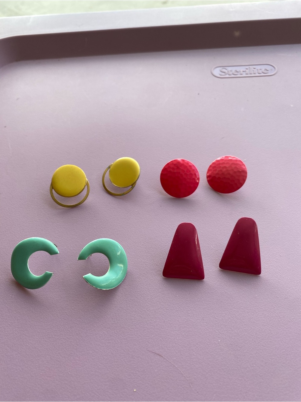 Four pairs of vintage colorful earrings